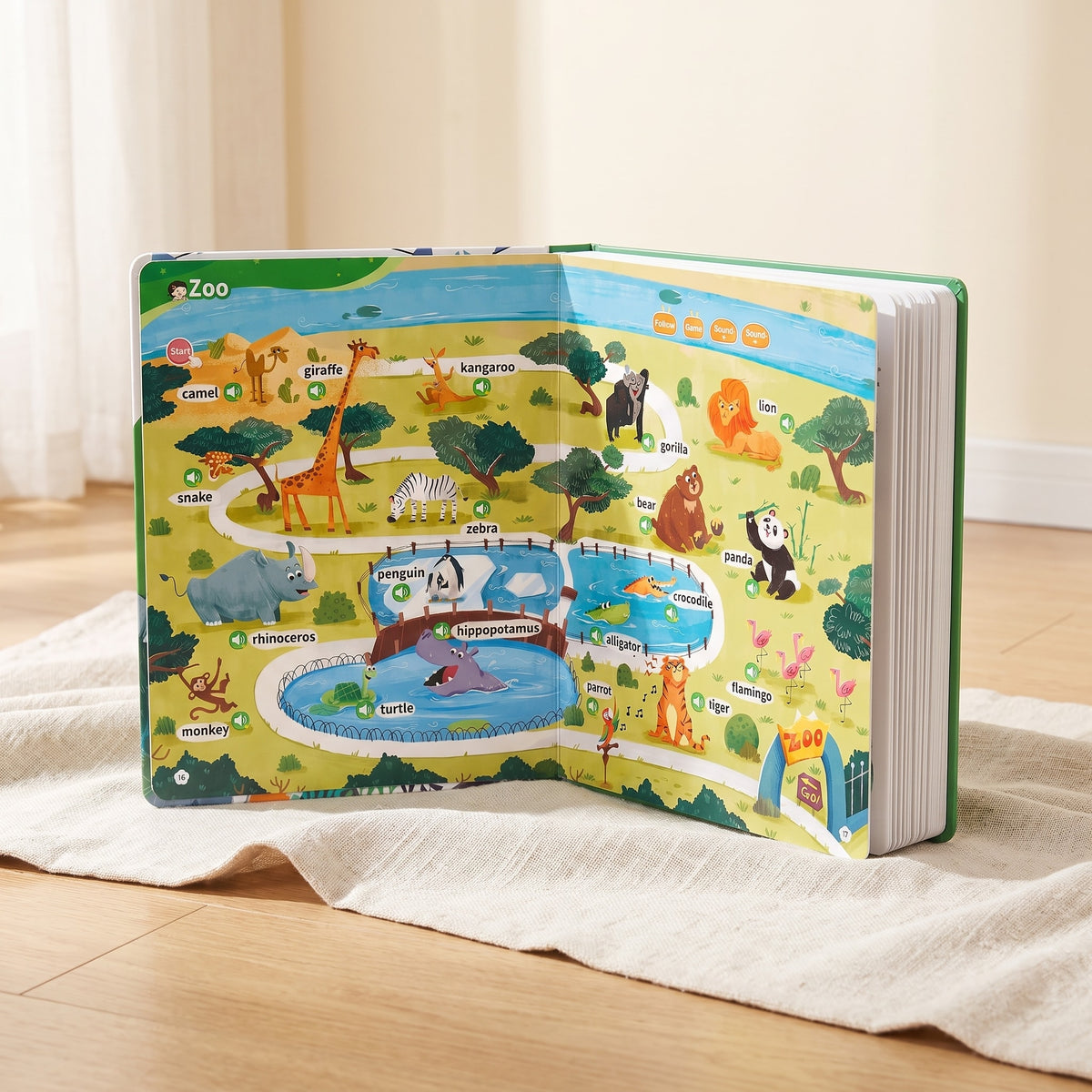 500 Words Sound Book open on a linen rug, showing the illustrated zoo spread with tap-to-hear word pictures